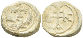 Byzantine Lead Seal (21mm, 16,1 g). Eagle with uplifted wings and head turned to right; in field above head on eagle, cruciform invocative monogram. R...