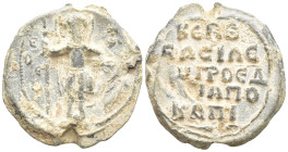 Byzantine Lead Seal (22mm, 6.4 g). St Theodore standing, in military costume, holding a lance in his right hand and supporting a shield on the ground ...