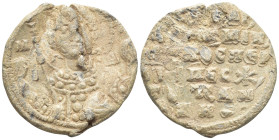 Byzantine Lead Seal (6.9 Gr. 23mm.) Facing bust of St. Michael the Archangel, holding scepter and globus.. Rev. Legends five lines.