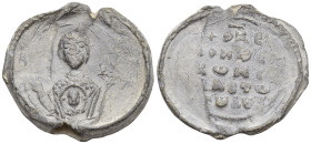 Byzantine Lead Seal (7.4 Gr. 25mm.) 
Nimbate bust of the Virgin Mary, facing, between two crosses, holding a medallion of a facing head of Christ on h...