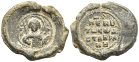 Byzantine Lead Seal, (6 Gr. 18mm.) 
Nimbate facing bust of Saint Theodore, holding spear over his right shoulder and resting shield on his left arm.
R...