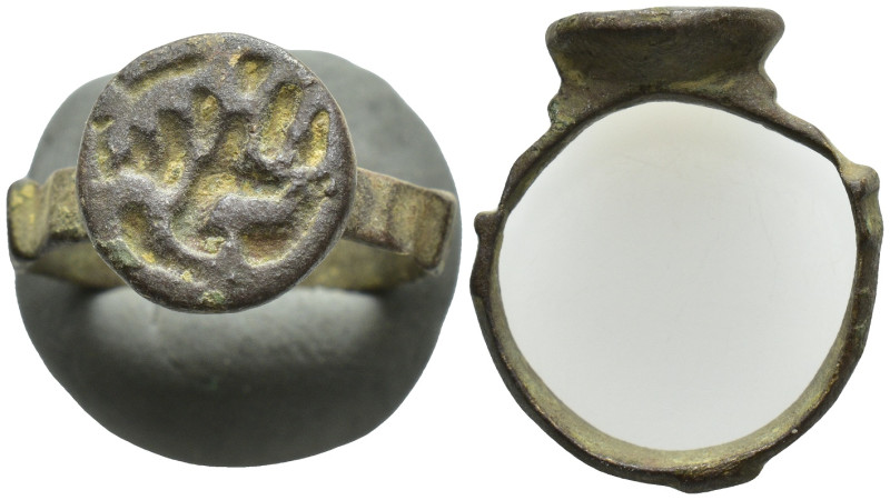 A Bronze ring . (5.2 Gr. 16mm.)