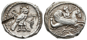 PHOENICIA, Tyre. Uncertain king, (dated RY 3 = 355/4 BC).
AR Shekel (21,8mm 8,8g) Attic standard
Obv: Deity, holding reins and bow, riding hippocamp...