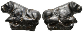 Ancient bronze figurine of seated lion
(21,2g 30mm diameter)