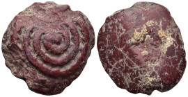 Ancient stone object with spiral ornament
(50,8g 33,4mm diameter)