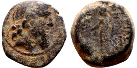 Uncertain ruler (Seleukid kings: III – I BC_ Bronze. Obverse: Bust of Zeus. Rev: Standing figure