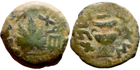 JUDAEA. Jerusalem mint. First Jewish Revolt (66-70 AD). AE prutah. Obv.: Two handled amphora. Rev.: vine leaf on small branch, bears the legend "for t...