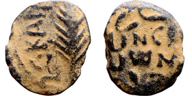 JUDAEA. Jerusalem mint. Porcius Festus (time of Nero, 59-62 AD). Bronze Prutah. Obv.: Palm-branch surrounded by L C•KAIC-APOC. Rev.: NEP • ωNO • C in ...