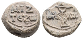 BYZANTINE LEAD SEAL. (John hypatos?) and meizoteros (AD 8th–9th centuries)
Obv: Cruciform invocative monogram. In the quarters: τῷ σῷ δούλῳ. Wreath b...