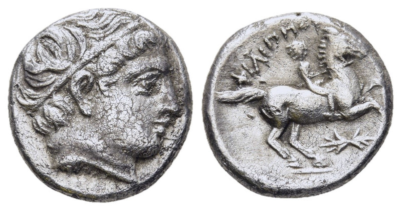 KINGS OF MACEDON. Philip II (359-336). 1/5 Tetradrachm. Pella.

Obv: Head of Apo...