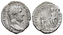 HADRIAN (117-138). Denarius. Rome.

Obv: HADRIANVS AVG COS III P P.
Laureate head right.
Rev: RESTITVTORI AFRICAE.
Hadrian standing left, raising up A...