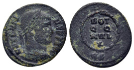 MAXENTIUS (307-312). Follis. Rome.

Obv: MAXENTIVS P F AVG.
Laureate head right.
Rev: VOT / Q Q / MVL X // RS.
Legend in four lines within wreath.

RI...