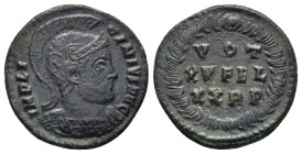 LICINIUS I (308-324). Follis. Rome.

Obv: IMP LICINIVS AVG.
Helmeted and cuirassed bust right.
Rev: VOT / XV FEL / XX R P in three lines within wreath...