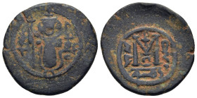 ISLAMIC. Umayyad Caliphate. temp. Yazid I ibn Mu'awiya (AH 60-64) AE Fals / Follis. Arab-Byzantine type. Pseudo Damascus mint.

Obv: Imperial figure s...