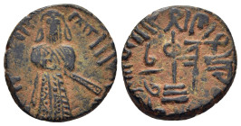 ISLAMIC. Umayyad Caliphate. Time of 'Abd al-Malik ibn Marwan (AH 65-86). Ae Fals. Standing Caliph type. Halab.

Obv: Caliph standing facing, placing h...