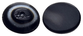 HELLENISTIC PERIOD. An engraved black and white agate ring bezel, depicting a mouse seated left, eating (ca. 4th-1st century BC).

Condition: As made....