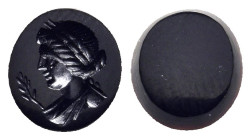 ROMAN PROVINCIAL. An engraved onyx seal stone, depicting the bust Apollo facing left, laurel branch in front (ca. 1st-2nd century AD).

Condition: A...