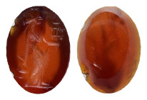 ROMAN PROVINCIAL. An engraved carnelian seal stone, depicting Isis standing right, holding basket ad sistrum (ca. 1st-3rd century AD).

Condition: Chi...