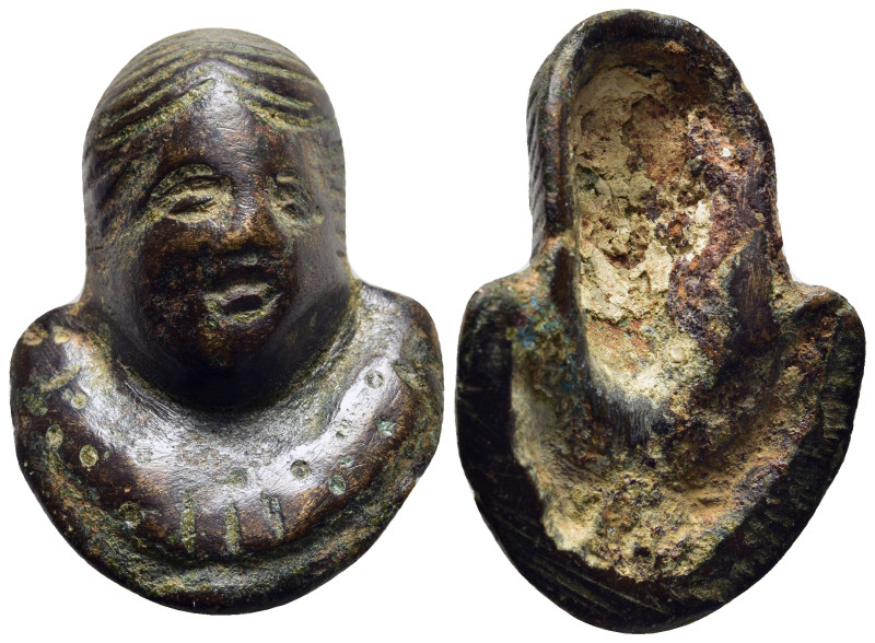 ROMAN PROVINCIAL. A bronze applique depicting a facing half length female bust (...