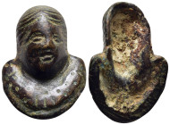ROMAN PROVINCIAL. A bronze applique depicting a facing half length female bust (ca. 1st-3rd century AD).

Condition: Very fine.
 
Weight: 17,74g
Diame...