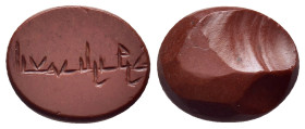 ISLAMIC. An engraved red jasper seal stone (ca. 1st - 3rd century AH).

Condition: A larger chip on bottom, otherwise as made
 
Weight: 0,71g.
Diamete...