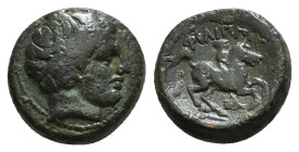 KINGS OF MACEDON. Philip II (359-336 BC). Ae Unit. Uncertain mint in Macedon.
Obv: Diademed head of Apollo right.
Rev: ΦΙΛΙΠΠΟΥ.
Naked youth on horse ...