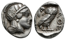 ATTICA. Athens. Tetradrachm (Circa 454-404 BC).
Obv: Helmeted head of Athena right, with frontal eye.
Rev: AΘE.
Owl standing right, head facing; olive...