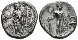 Cilicia, Issos AR Stater. Circa 385-380 BC. Obverse die signed by Apatorios. Apollo standing facing, head left, holding patera and placing hand on lau...