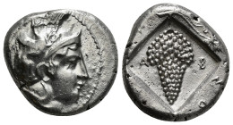 CILICIA, Soloi. 385-350 BC. AR Stater Obv : Helmeted head of Athena right; helmet decorated with a griffin /Rev : SO-LE-WN, Grape cluster on vine, wit...