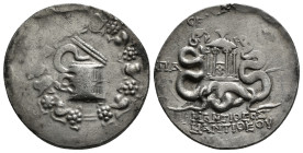 PHRYGIA, Apameia. C. Fannius, Propraetor. 49 BC. AR Cistophoric Tetradrachm. Cista mystica with serpent; all within ivy wreath / C. FAN PONT PRO, two ...