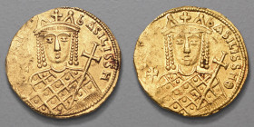 IRENE (797-802). Solidus (4,50 g) Constantinople.
A/ Buste couronné d'Irène de face vêtue du loros, tenant un globe crucigère et un sceptre cruciforme...