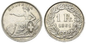 Schweiz. Eidgenossenschaft.

 1 Franken (Silber). 1861 B.
Vs: Sitzende Helvetia links.
Rs: Wert und Jahr in Kranz.

23 mm. 4,98 g. 

HMZ 1203e...