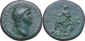 Nero (54-68). AE Dupondius. Obv. Radiate head right. Rev. ROMA S C. Roma, helmeted, in military dress, seated left on cuirass, holding wreath in right...