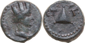 Trajan (98-117). AE 13 mm, Caesarea mint (Cappadocia), dated RY 3 (100-101). Obv. Turreted and draped bust of Tyche right. Rev. Pyramid flanked by ET-...