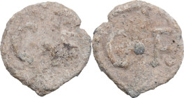 Leads from the Ancient World. PB Tessera, Roman period. D/ C . F. R/ C . F. PB. 3.86 g. 18.5 mm.