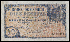 1936. Burgos. 10 pesetas. (Ed. 418N). 21 de noviembre. "INUTILIZADO" en perforación. Esquinas levemente reparadas. Se entrega encapsulado. Raro. (EBC)...