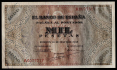 1938. Burgos. 1000 pesetas. (Ed. 434) (Pick 115a). 20 de mayo. Serie A. Numeración A0077317. Apresto original. Extraordinario ejemplar. Se entrega enc...