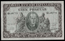 1940. 100 pesetas. (Ed. 438N). 9 de enero, Colón. Serie G. "INUTILIZADO" en perforación. Doblez central. Apresto original. Escaso. EBC+.