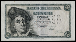 1948. 5 pesetas. (Ed. 455N). 5 de marzo, Elcano. Serie A. "INUTILIZADO" en perforación. Doblez central. Manchita del tiempo en margen superior. Escaso...