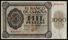 1936. Burgos. 1000 pesetas. (Ed. falta). 21 de noviembre. Serie B. Sobrecarga tipográfica "MUESTRA" en rojo en anverso. Se entrega encapsulado. Muy ra...