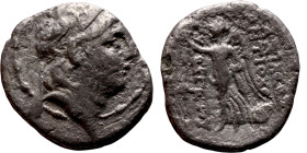 Antiochos VII (Seleukid King: 138-129 BC). Drachm. Obv: Bust of king. Rev: Nike walking to the left, holding a wreath.

17mm 3.19g