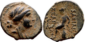 Antiochos III The Great (Seleukid King: 223-187 BC). AE bronze. Obv.: Laureate head of Apollo Rev.: Apollo seated left on omphalos, testing arrow and ...