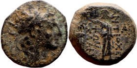 Antiochos VII (Seleukid King: 138-129 BC). Bronze. Obv: Bust of king Rev: Zeus standing left holding corinthian helmet in right hand and sceptre in le...