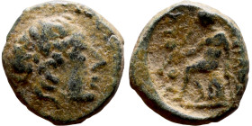 Antiochos III The Great (Seleukid King: 223-187 BC). AE bronze. Obv.: Laureate head of Apollo Rev.: Apollo seated left on omphalos, testing arrow and ...