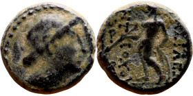 Seleukos II Kalinikos (Seleukid King: 246 - 226 BC) AE bronze. Obv Obv.: : Diademed head of Seleucus II right Reverse: Apollo seated left on omphalos,...