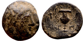 Hellenistic period coin (3-1 century BC) Bronze coin. Obv: Bust of Dionysios? Rev: Amphora

17mm 4.45g

Artificial sand patina