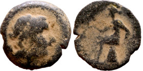 Antiochos III The Great (Seleukid King: 223-187 BC). AE bronze. Obv.: Laureate head of Apollo Rev.: Apollo seated left on omphalos, testing arrow and ...