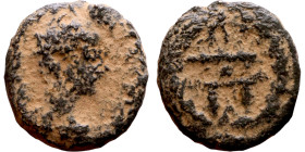 Hellenistic period coin (3-1 century BC) Bronze coin. 

14mm 2.77g

Artificial sand patina