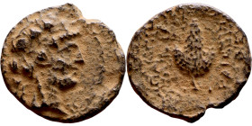 Hellenistic period coin (3-1 century BC) Bronze coin. Obv: Bust of Athena. Rev: A bunch of grapes

15mm 1.89g

Artificial sand patina