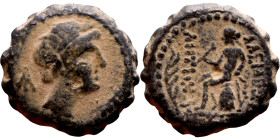 Antiochos III The Great (Seleukid King: 223-187 BC). AE bronze. Obv.: Laureate head of Apollo Rev.: Apollo seated left on omphalos, testing arrow and ...